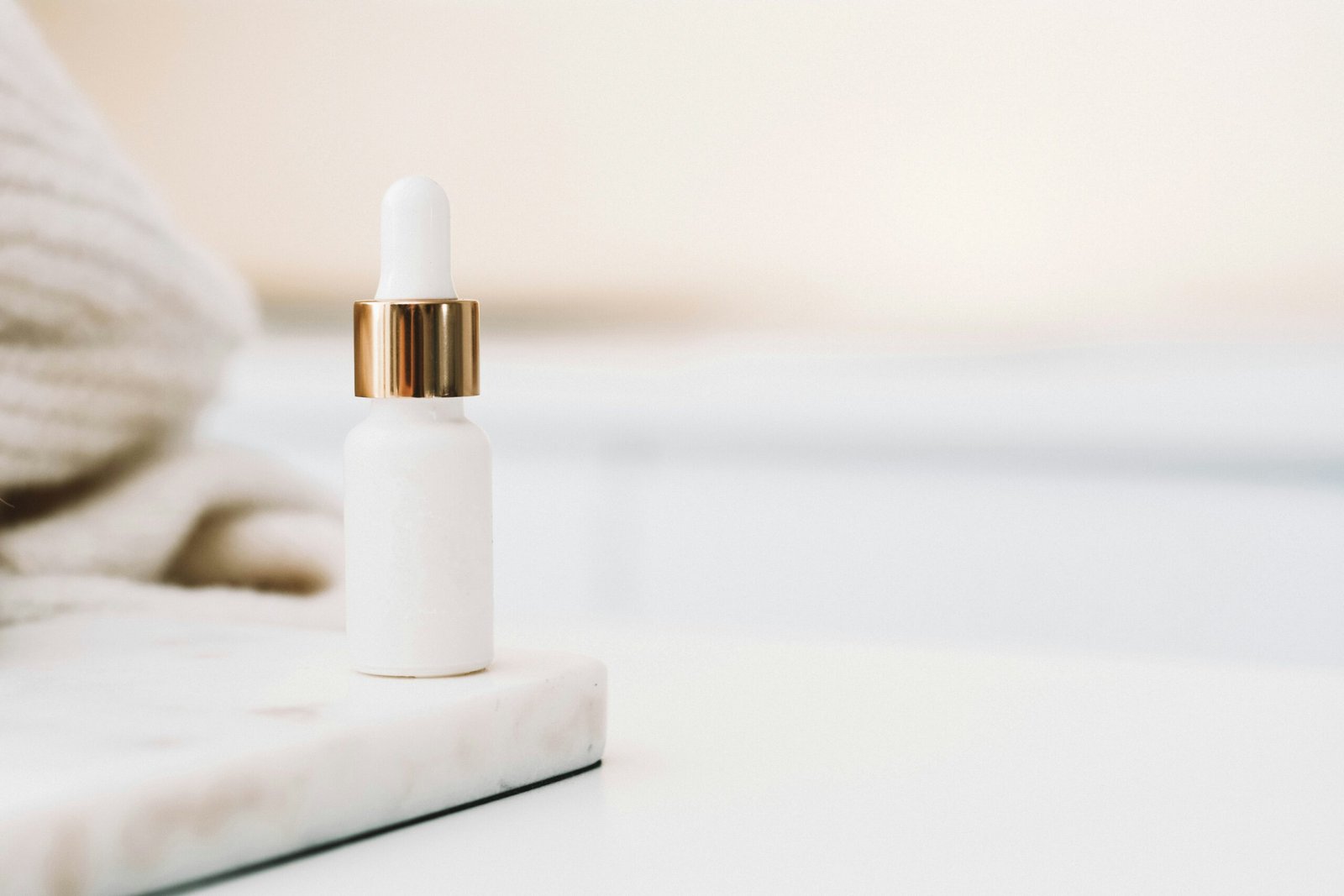 white drop bottle on